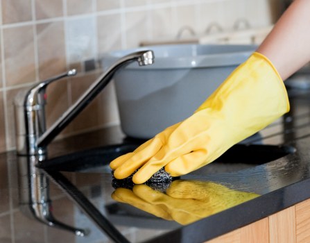 Local oven cleaner in Hackney working on a built-in domestic oven