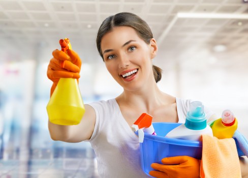 Professional office cleaners working in a Hackney workplace