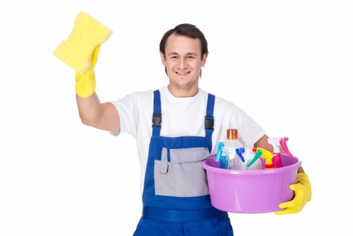 Professional carpet cleaning equipment and cleaned flooring in a home interior