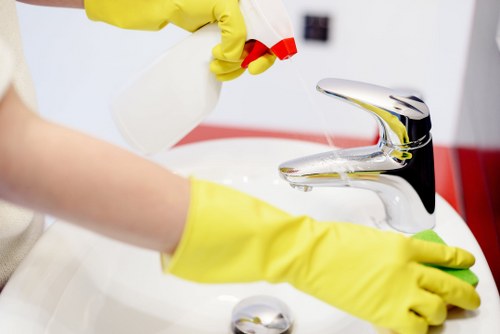 Cleaner in Hackney preparing a spotless living room