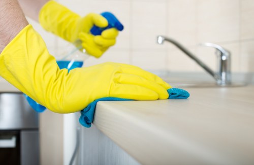 Estimator reviewing carpet cleaning job size and load rate